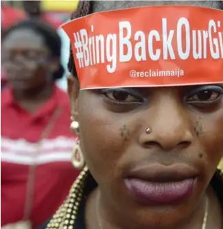  ??  ?? When the Chibok schoolgirl­s were taken by Boko Haram, thousands protested and the hashtag #BringBackO about rescuing the kidnapped girls anymore.