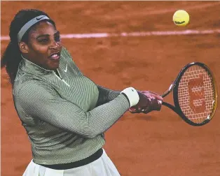  ?? ANNE- CHRISTINE POUJOULAT/AFP VIA GETTY IMAGES FILES ?? Former world No. 1 Serena Williams of the U.S. will warm up for Wimbledon by partnering with Tunisia's Ons Jabeur at the Eastbourne Internatio­nal in England.