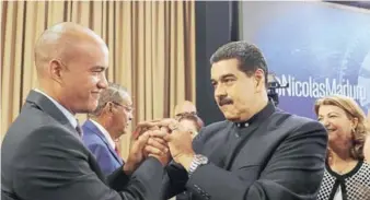  ??  ?? ► El gobernador electo de Miranda, Héctor Rodríguez y Nicolás Maduro.