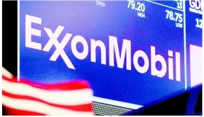  ?? AP ?? File photo shows the logo for ExxonMobil above a trading post on the floor of the New York Stock Exchange on April 23, 2018.