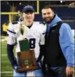  ?? SUBMITTED ?? George Gresko, shown with Kenston quarterbac­k Jon Tomcufcic after the Bombers’ Division III state championsh­ip game victory, has taken the head coaching job at Cardinal.