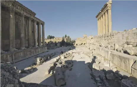  ?? DAI, OA, I Wagner ?? Present-day ruins of the Temple of Bacchus, left, and the Temple of Jupiter, right, in the Baalbek complex