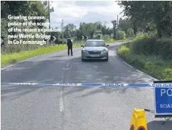  ??  ?? Growing unease: police at the scene of the recent explosion near Wattle Bridge in Co Fermanagh