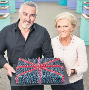  ??  ?? Paul Hollywood and Mary Berry, who says when it came to picking an overall winner this year, ‘we genuinely couldn’t call it’