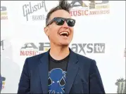  ?? DUANE PROKOP/TNS/GETTY ?? Mark Hoppus of Blink-182 had spiky hair at an awards show in 2014, but months of chemothera­py ruined that look. The singer/bassist recently completed what he hopes is his last round of chemo.