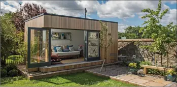  ??  ?? GREEN HOUSES: Auchterard­er-based JML specialise in attractive ‘garden rooms’ which have a variety of uses.