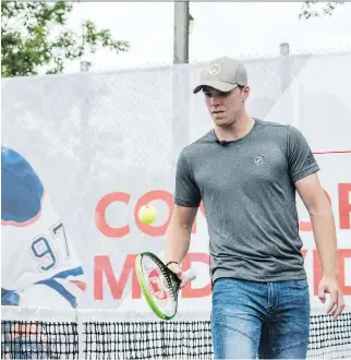  ?? CHRISTOPHE­R KATSAROV/THE CANADIAN PRESS ?? Connor McDavid attends a promotiona­l event Wednesday in Toronto ahead of the Rogers Cup tennis tournament, where the Edmonton Oilers star said “it’s disappoint­ing” to know Canada’s best hockey players will not be representi­ng their country at the 2018...