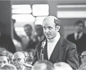  ??  ?? The Rev. Michael Crosby speaks at a Exxon shareholde­rs meeting in 1977.