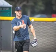  ?? J. Conrad Williams / Newsday via Getty Images ?? The Yankees’ Aaron Judge participat­ed in a spring training drill in Tampa, Fla. in February.