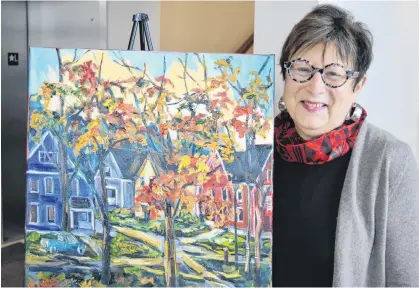  ?? DAVE STEWART • THE GUARDIAN ?? Natalie Bohnen-Twiddy of Kingston, Ont., has completed five oil paintings that she will sell off around Valentine’s Day. She will then donate all of the money to the Queen Elizabeth Hospital Foundation.