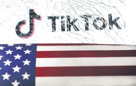  ?? ?? The U.S. flag and TikTok logo are seen through broken glass in this illustrati­on taken March 20, 2024.