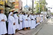  ?? ?? Silent protest outside Fatima church in Colombo 10.
Pic by Indika Handuwala