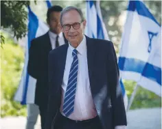  ?? (Yonatan Sindel/Flash90) ?? DIASPORA AFFAIRS MINISTER Nachman Shai arrives to the President’s Residence last month.