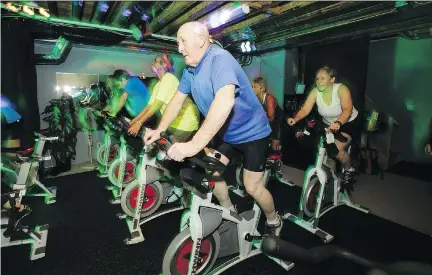 ??  PHOTOS: JANA CHYTILOVA/OTTAWA CITIZEN ?? Tony Cleary takes part in a spin class at the Moffat Farm Cycle Club, a not-for-profit indoor cycle club.