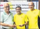  ??  ?? From Left, Vijay Rai, Shailesh Daga and Ayaz Bilawala, winners of the men’s 45+ doubles title.