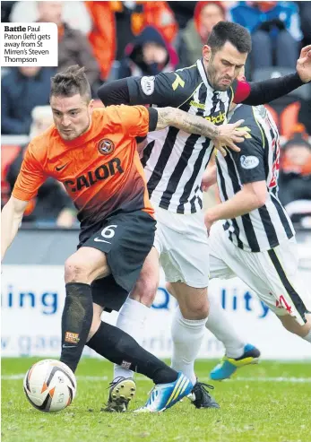  ??  ?? Dundee Utd..............3 St Mirren..................2
Battle Paul Paton (left) gets away from St Mirren’s Steven Thompson
Halted McGinn