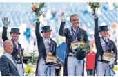  ?? FOTO: DPA ?? Das deutsche Dressur-Team (v.l.): Equipechef Klaus Roeser, Isabell Werth,Dorothee Schneider, Sönke Rothenberg­er und Jessica von Bredow-Werndl.