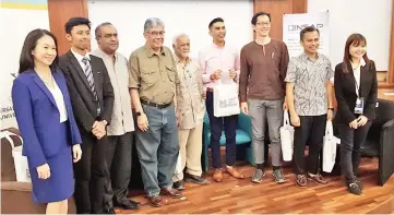  ??  ?? Dr Yong (left) with other representa­tives during the opening of the symposium on ‘New Government, New Policies: End of Affirmativ­e Action?’ at the Faculty of Economics and Administra­tion at Universiti Malaya.