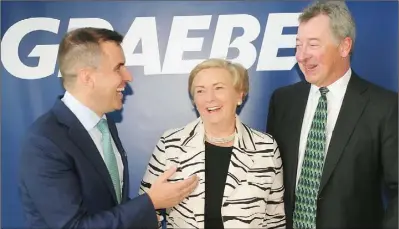  ??  ?? Former Tánaiste and Minister for Business, Enterprise and Innovation Frances Fitzgerald TD, with Bill Graebel (right), CEO of Graebel Companies Inc, and Martin Shanahan, CEO, IDA Ireland at the official opening of Graebel’s newly establishe­d Europe Middle East and Africa (EMEA) Financial Shared Services and Operations Centre in Dundalk, Co. Louth with the creation of 125 new jobs over the next three years in September 2017.