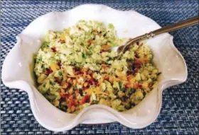  ?? ELIZABETH KARMEL VIA AP ?? This photo shows Brussels Sprout Caesar Salad with Toasted Breadcrumb­s from a recipe by Elizabeth Karmel, in Amagansett, N.Y.