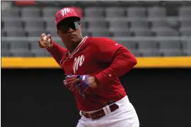  ?? FERNANDO LLANO — THE ASSOCIATED PRESS ?? Diablos Rojos second baseman Robinson Cano, who previously played for the New York Yankees and New York Mets, throws a ball during a practice session on Tuesday, March 19, in Mexico City.