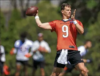 ?? AARON DOSTER / AP ?? “I feel great,” Bengals QB Joe Burrow said. “Obviously, this is my first offseason in the NFL so I’ve been able to take advantage of that as far as my body and my throwing and my mind and all of that.”