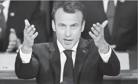  ?? CHIP SOMODEVILL­A GETTY IMAGES ?? French President Emmanuel Macron addresses a joint meeting of the U.S. Congress in the House Chamber at the U.S. Capitol Wednesday.