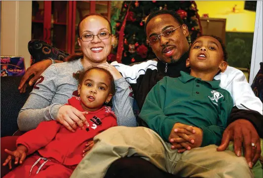 ?? SARAH J. GLOVER / PHILADELPH­IA INQUIRER 2003 ?? Connie and Brian Dawkins — with children Brionni, 3, and Brian Jr., 6, in January 2003 — celebrated their 24th wedding anniversar­y last month. They now have four children. The impact she has had on her husband’s life and career has been immense.