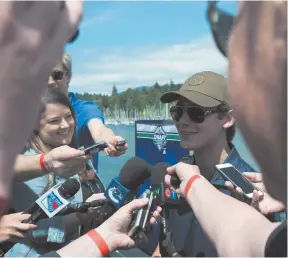  ?? CP PHOTO BYJONATHAN HAYWARD ?? NHL top prospect Jack Hughes, of Orlando, Fla., speaks to the media during a top prospects media availabili­ty in downtown Vancouver on Thursday.