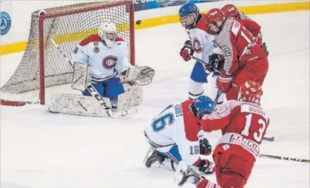  ?? BOB TYMCZYSZYN THE STANDARD ?? St. Catharines’ Matt Busby, No. 13, scores on the power play in junior B hockey versus Welland in this file photo. The Golden Horseshoe Conference playoffs open this weekend with St. Catharines playing Pelham and Welland taking on Ancaster.