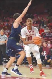  ?? NWA Democrat-Gazette/ANDY SHUPE ?? Arkansas forward Daniel Gafford (10) came off the bench to score 8 points in 15 minutes in the Razorbacks’ 78-66 victory over Central Oklahoma on Friday night at Walton Arena in Fayettevil­le.