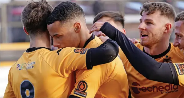  ?? Karl Dunkerley ?? ● Jordan Archer celebrates after scoring the first goal against Guiseley on Saturday. Match report on page 37.