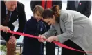  ?? Photograph: Ben Mckay/AAP ?? New Zealand Prime Minister Jacinda Ardern cuts the ribbon on a stretch of the Great Lake Pathway on Thursday.