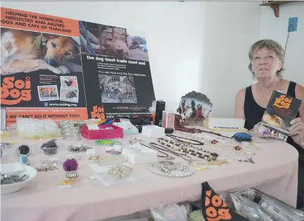  ?? AIDAN COX ?? Fran Bryerton sits next to a kitchen table where she sells jewelry to raise money for Soi Dog Foundation in Thailand, her latest effort to help the animalresc­ue charity. Last year she held a yard sale that raised $1,200.