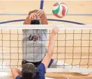  ?? OKLAHOMAN BRYAN TERRY/THE ?? Lora Webster goes for a block during training with the U.S. women's sitting volleyball team earlier this summer at the U.S. Paralympic Training Center at Central Oklahoma.