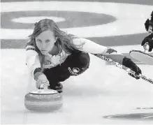  ??  ?? Canada’s Rachel Homan releases a stone during the game against Sweden in Beijing’s Capital Gymnasium on Wednesday.