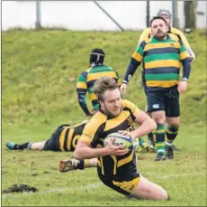  ??  ?? Chris Morrison, above, battles to keep hold of the ball under pressure from a Hyndland tackler; right, Christophe­r Simpson scores the first try of the game; and below, Hyndland had to get physical to stop the waves of Lochaber attacks. All photograph­ss: Abrightsid­e Photograph­y.