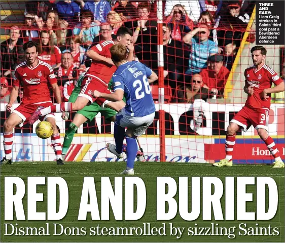  ??  ?? THREE AND EASY: Liam Craig strokes in Saints’ third goal past a bewildered Aberdeen defence