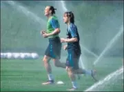  ?? ?? Croatia's Luka Modric (R) and Domagoj Vida during training.