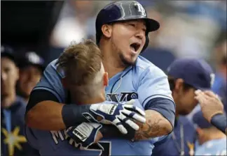  ?? MIKE CARLSON, THE ASSOCIATED PRESS ?? Tampa Bay Rays’ Jesus Sucre celebrates his home run with Logan Morrison during the fourth inning.