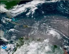  ??  ?? IN THIS GEOCOLOR IMAGE GOES-16 SATELLITE IMAGE TAkEN JULy 8 AT 15:00 UTC, SHOWS TROPICAL STORM BERyL (CENTER RIGHT) MOVING ACROSS THE LESSER
Antilles in the eastern Caribbean Sea, and Tropical Storm Chris (top left) off the U.S. East Coast. NOAA VIA AP