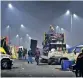  ??  ?? Farmers leaving the Ghaziabad protest site on Thursday night