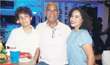  ?? PHOTOS BY JANET SILVERA ?? Chairman of the Jamaica Tourist Board, John Lynch, flanked by his children Sean (left) and Rose.