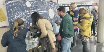  ?? PICTURE BY CHARLIE HELLEWELL ?? The colouring wall at the South Downs Centre proved popular with visitors