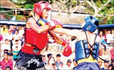  ?? PHOTO SUPPLIED ?? A kun Khmer kickboxer lands a punch on his opponent during a bout at the 2017 Sea Festival in Kep at the weekend.