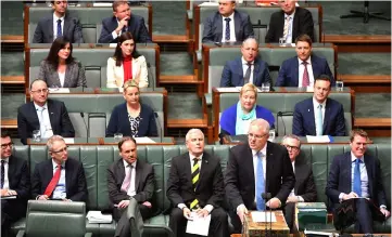  ?? — Reuters photo ?? Morrison speaks in the House of Representa­tives at Parliament House in Canberra.