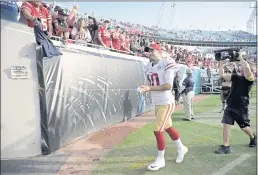  ?? PHELAN M. EBENHACK — THE ASSOCIATED PRESS ?? Niners quarterbac­k Jimmy Garoppolo (10) leaves the field after last Sunday’s game against the Jaguars in Jacksonvil­le, Fla.