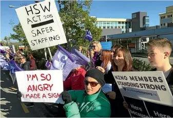  ?? MARTIN DE RUYTER/STUFF ?? Nurses protest outside Nelson Hospital during the 24-hour strike by nurses nationwide over staffing levels and pay.