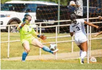  ?? Photo submitted ?? ■ National Park freshman goalkeeper Brooklyn Mize, left, clears a shot out of the goal during Sunday’s loss to Northern OklahomaTo­nkawa. Photo courtesy of Aaron Brewer.