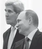  ?? SERGEI KARPUKHIN/ASSOCIATED PRESS ?? Russian President Vladimir Putin, right, and U.S. Secretary of State John Kerry arrive Tuesday for a meeting in the Kremlin in Moscow. Kerry said Tuesday the two countries must find common ground on Syria.